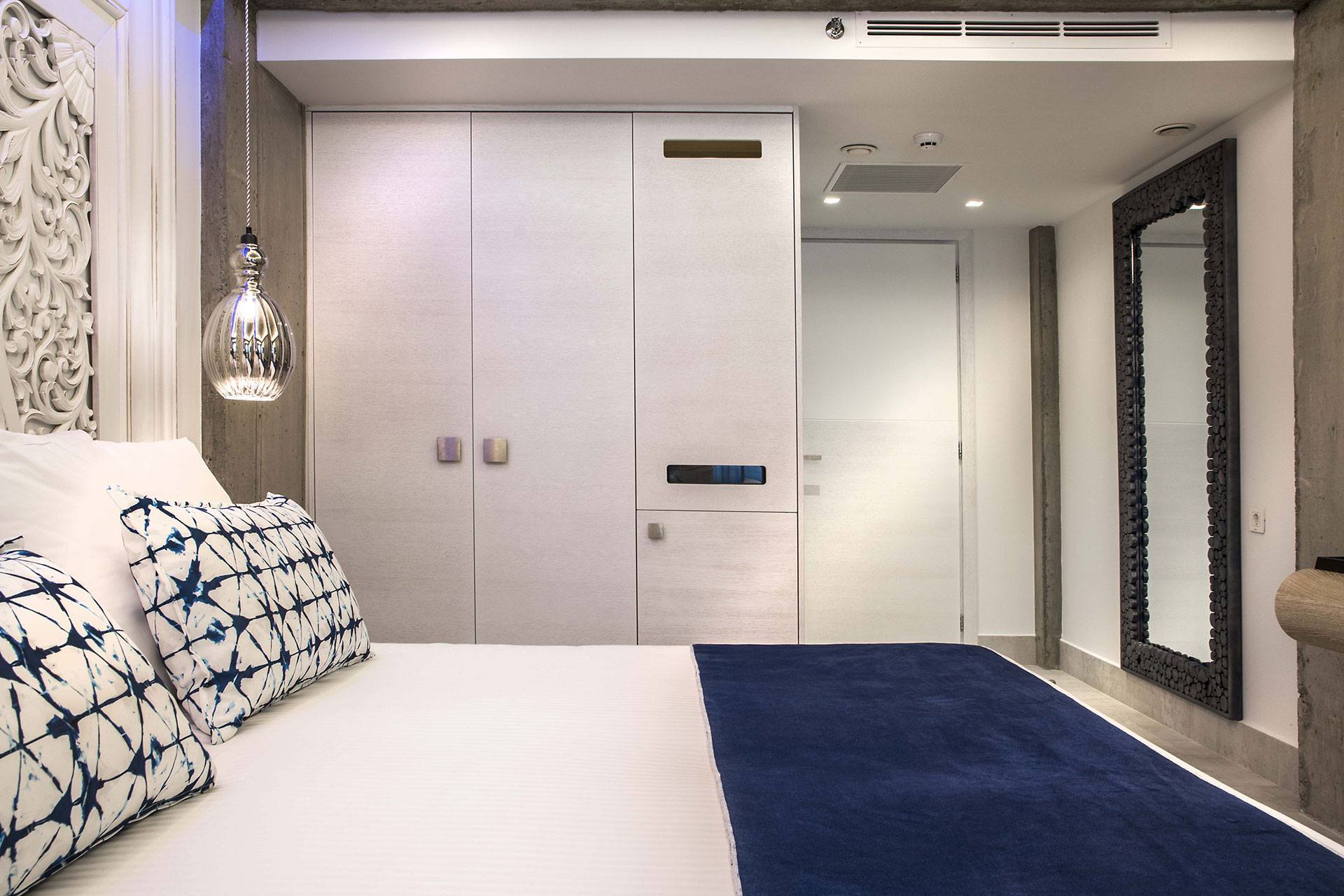 Cretan Blue Beach Hotel hotel room with double bed with white - blue linen, and large closet