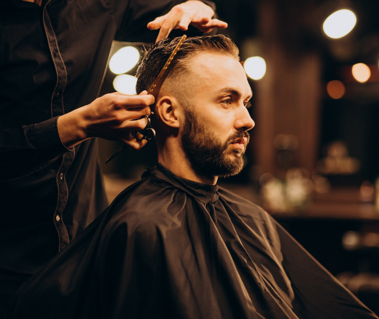 Young Man Barbershop Trimming Hair